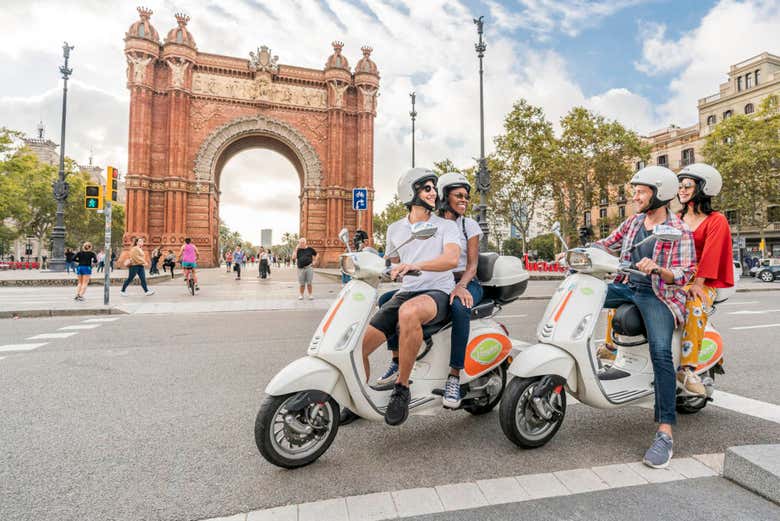 Vespas by the Arc de Triomf